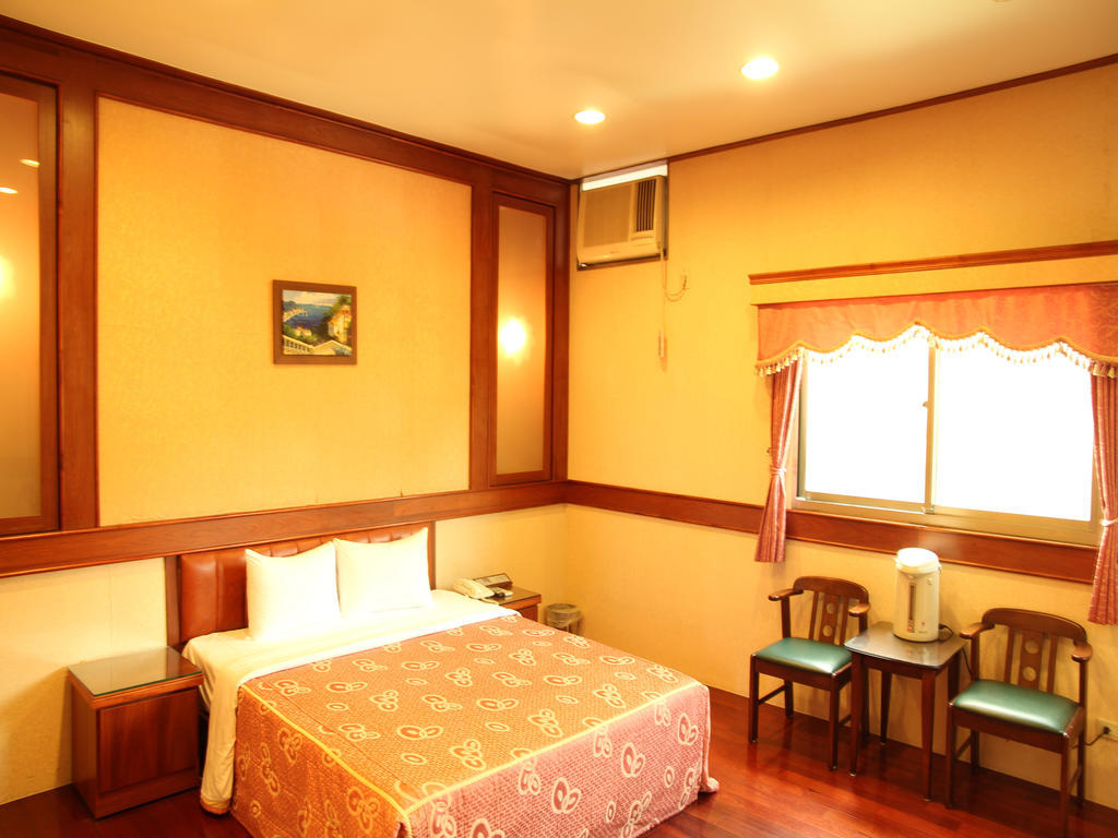 Fukun 5 Motel Цзяоси Номер фото